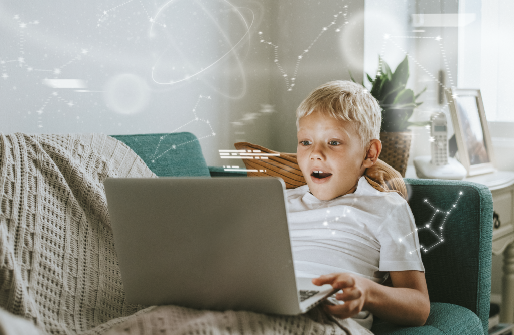 Boy with laptop using AI