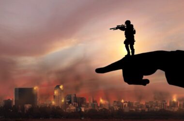 Hand holding a soldier pointing to an attacked teritory