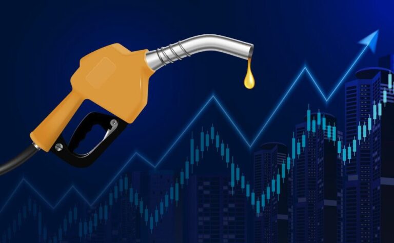A gas filler with a rising bar in the background