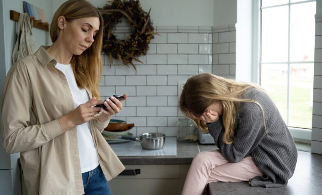 Mother daughter facing cyberbullying