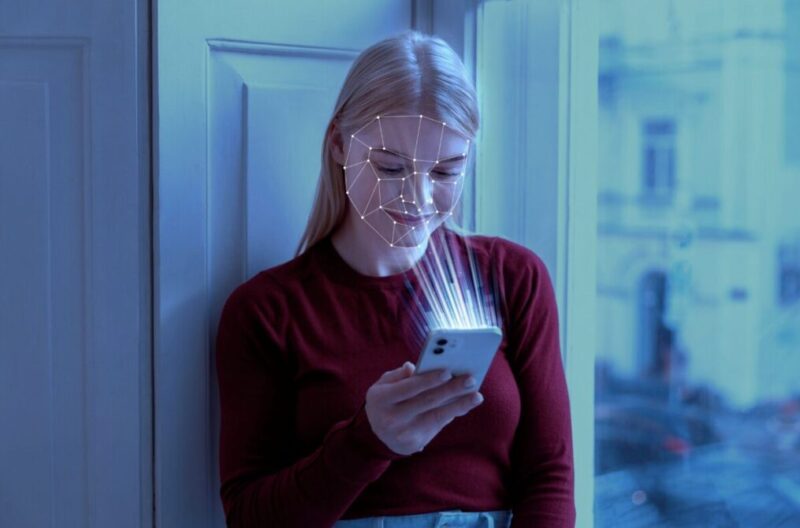 A young woman having her face scanned for AI photos