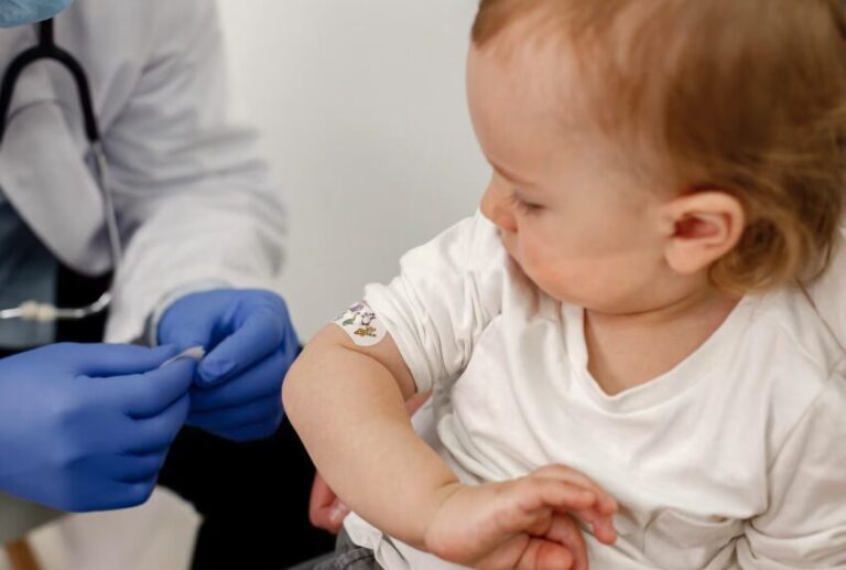baby getting vaccinated for prevention of measles outbreak