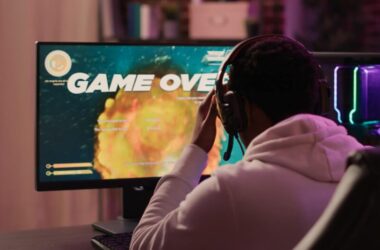 A man playing video games on computer.
