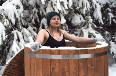 Woman doing a cold plunge in an ice bath