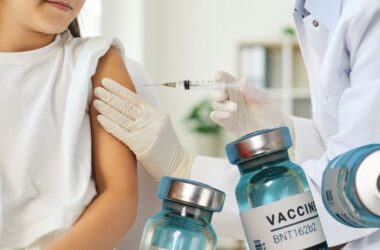 Closeup of a girl getting vaccinated